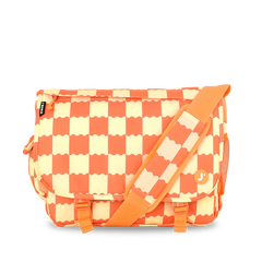 A rectangular messenger bag with a bold orange and cream checkerboard pattern, featuring an orange adjustable shoulder strap and a small circular orange logo on the front pocket.