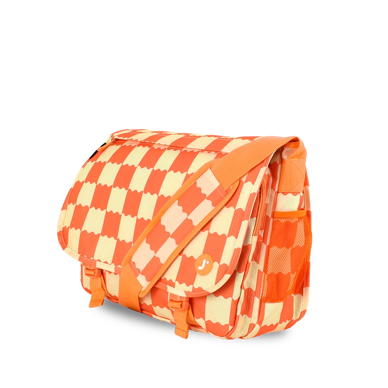 A shoulder bag with a vibrant orange and cream checkerboard pattern, featuring a wide orange shoulder strap and a side mesh pocket, shown on a plain white background.