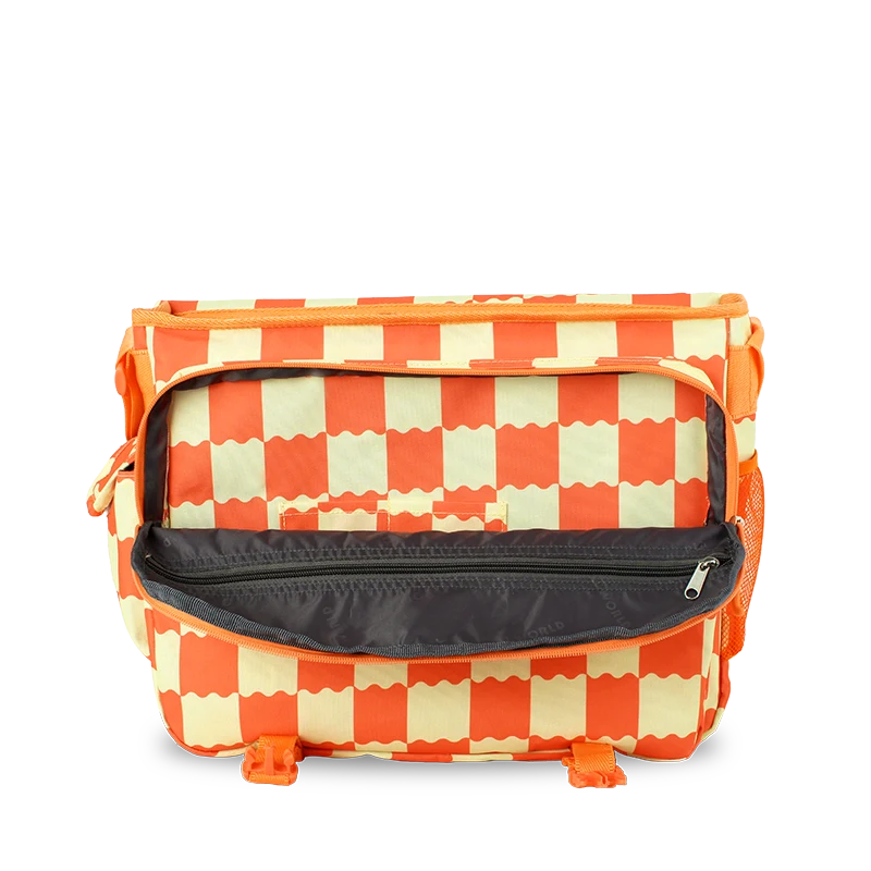 A rectangular utility bag with an orange and cream wavy checkered pattern, featuring an open front zippered pocket and orange webbing straps, shown on a plain white background.