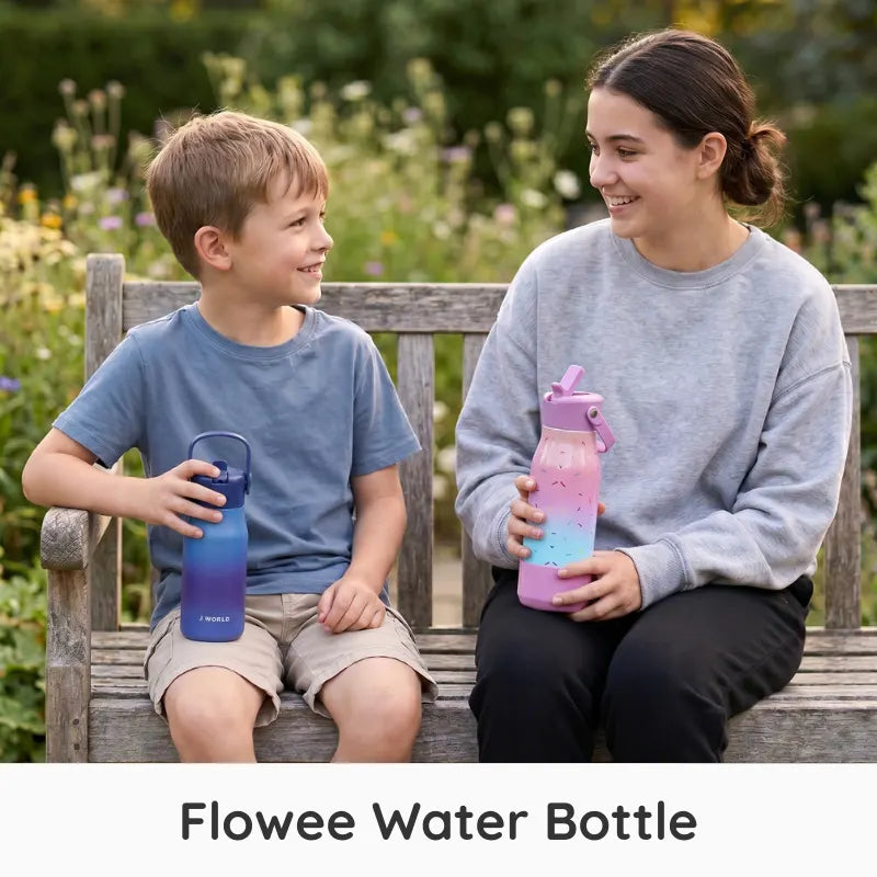 Two people sitting on a wooden bench outdoors, each holding a Flowee water bottle. One bottle is blue-to-purple gradient, and the other is pink-to-purple gradient.
