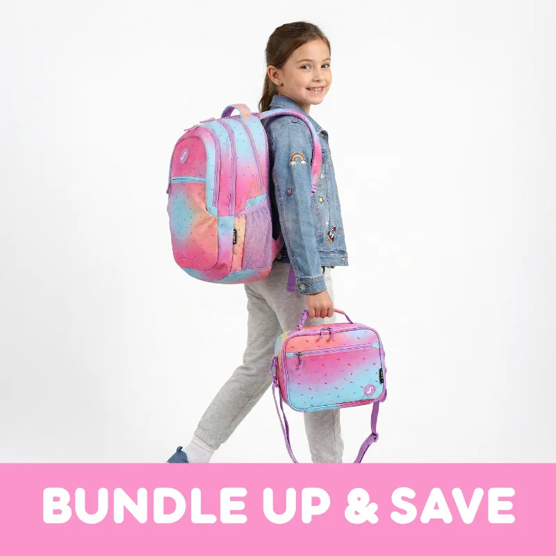 A young girl wearing a denim jacket and gray sweatpants is shown from the back, carrying a pastel pink, blue, and purple gradient backpack while holding a matching lunch bag. A pink banner at the bottom reads 'BUNDLE UP & SAVE'.
